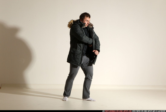 Man Adult Muscular White Fighting with gun Standing poses Casual