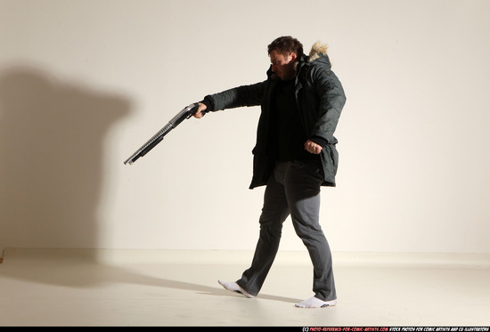 Man Adult Muscular White Fighting with gun Standing poses Casual