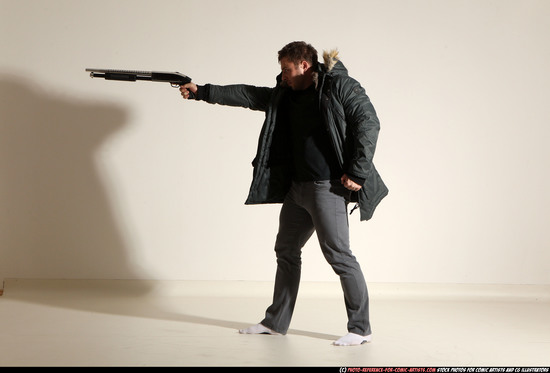 Man Adult Muscular White Fighting with gun Standing poses Casual