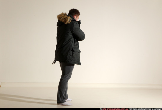 Man Adult Muscular White Fighting with gun Standing poses Casual