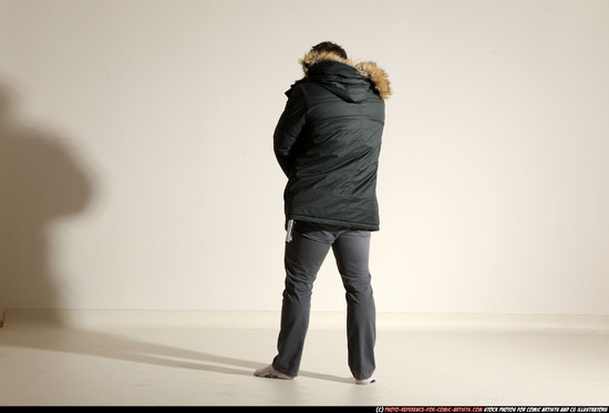 Man Adult Muscular White Fighting with gun Standing poses Casual