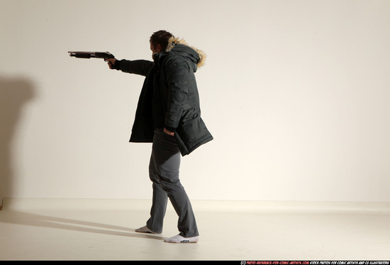 Man Adult Muscular White Fighting with gun Standing poses Casual