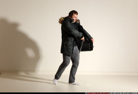 Man Adult Muscular White Fighting with gun Standing poses Casual