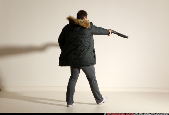 Man Adult Muscular White Fighting with gun Standing poses Casual