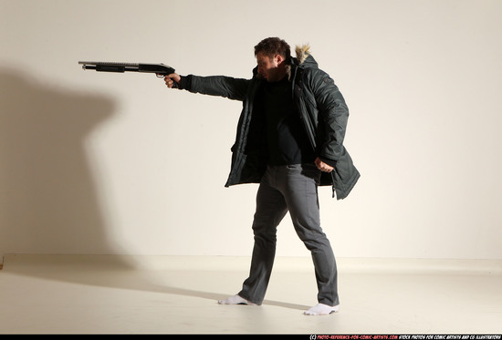 Man Adult Muscular White Fighting with gun Standing poses Casual