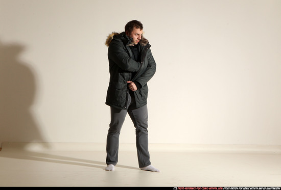 Man Adult Muscular White Fighting with gun Standing poses Casual