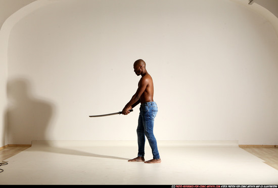 Man Adult Athletic Black Fighting with sword Moving poses Pants