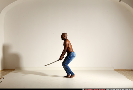 Man Adult Athletic Black Fighting with sword Moving poses Pants