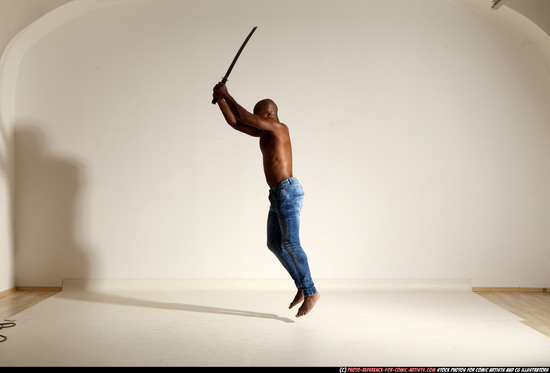 Man Adult Athletic Black Fighting with sword Moving poses Pants