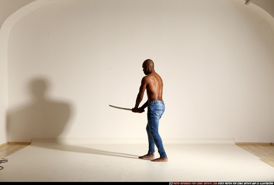 Man Adult Athletic Black Fighting with sword Moving poses Pants