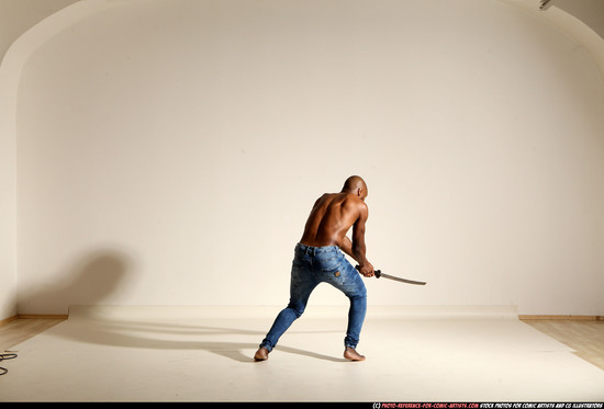 Man Adult Athletic Black Fighting with sword Moving poses Pants