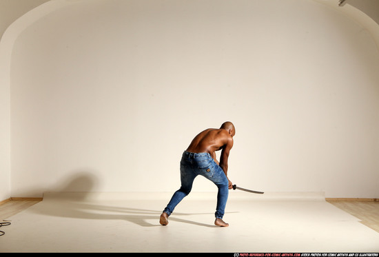 Man Adult Athletic Black Fighting with sword Moving poses Pants