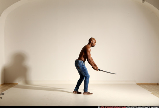 Man Adult Athletic Black Fighting with sword Moving poses Pants