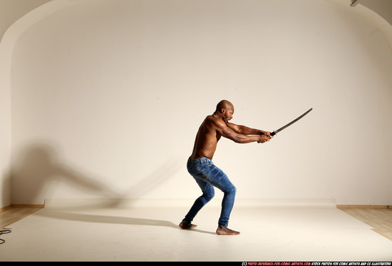 Man Adult Athletic Black Fighting with sword Moving poses Pants