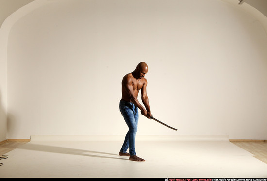 Man Adult Athletic Black Fighting with sword Moving poses Pants