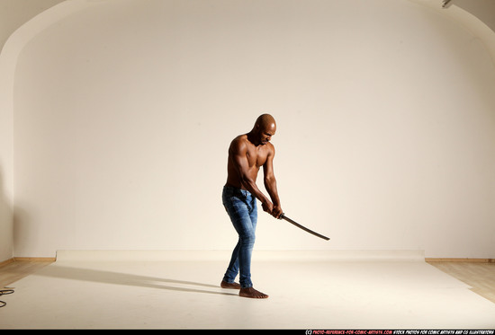 Man Adult Athletic Black Fighting with sword Moving poses Pants