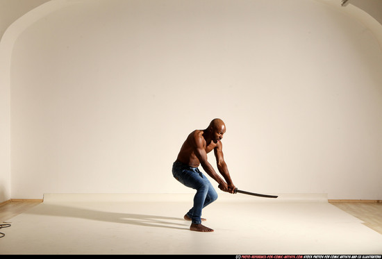 Man Adult Athletic Black Fighting with sword Moving poses Pants