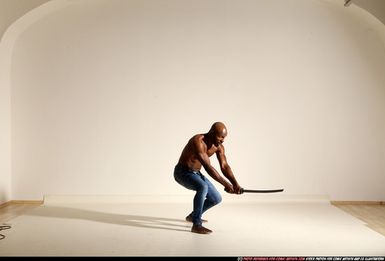 Man Adult Athletic Black Fighting with sword Moving poses Pants