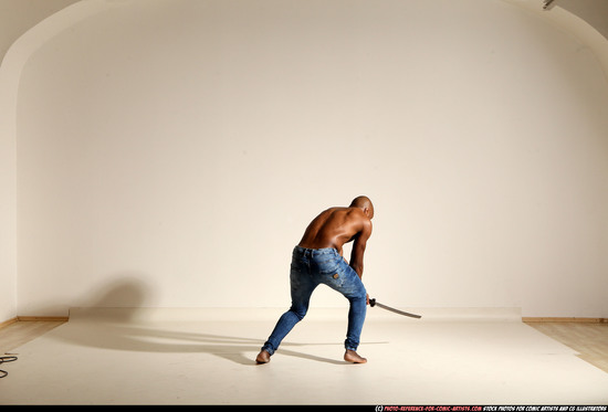 Man Adult Athletic Black Fighting with sword Moving poses Pants