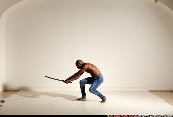 Man Adult Athletic Black Fighting with sword Moving poses Pants