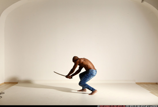 Man Adult Athletic Black Fighting with sword Moving poses Pants