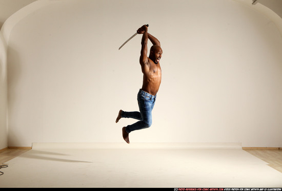 Man Adult Athletic Black Fighting with sword Moving poses Pants