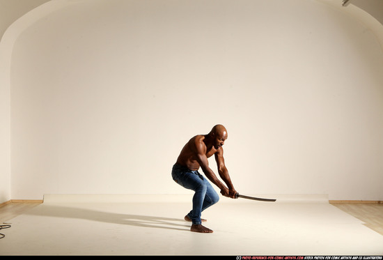 Man Adult Athletic Black Fighting with sword Moving poses Pants