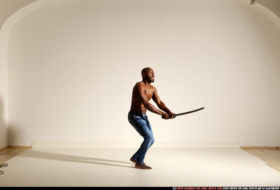 Man Adult Athletic Black Fighting with sword Moving poses Pants