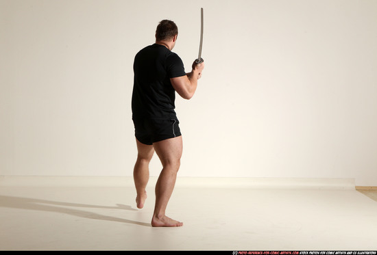 Man Adult Muscular White Fighting with sword Kneeling poses Sportswear