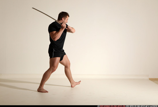 Man Adult Muscular White Fighting with sword Kneeling poses Sportswear