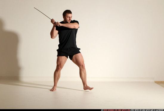 Man Adult Muscular White Fighting with sword Kneeling poses Sportswear