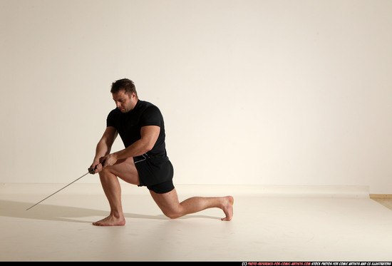 Man Adult Muscular White Fighting with sword Kneeling poses Sportswear