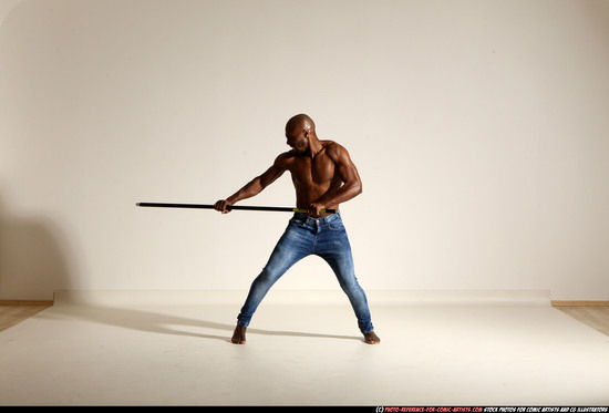 Man Adult Athletic Black Fighting with spear Moving poses Pants