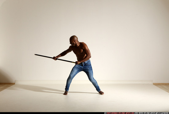 Man Adult Athletic Black Fighting with spear Moving poses Pants