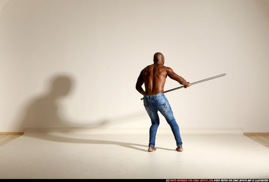 Man Adult Athletic Black Fighting with spear Moving poses Pants