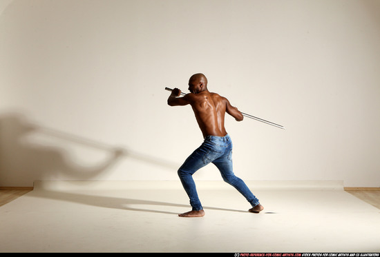 Man Adult Athletic Black Fighting with spear Moving poses Pants