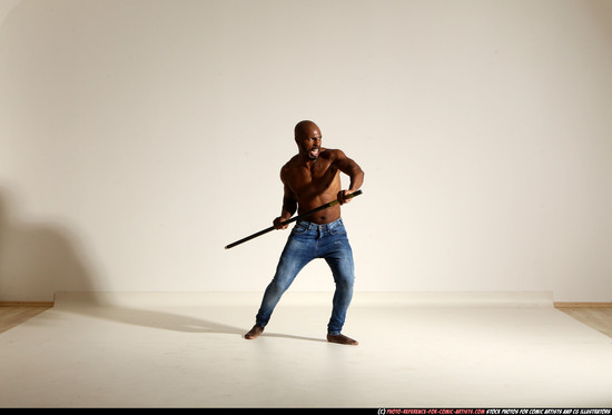 Man Adult Athletic Black Fighting with spear Moving poses Pants