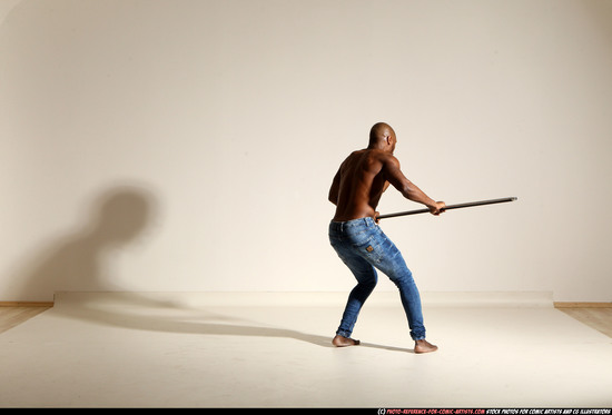 Man Adult Athletic Black Fighting with spear Moving poses Pants