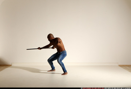 Man Adult Athletic Black Fighting with spear Moving poses Pants