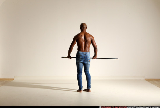 Man Adult Athletic Black Fighting with spear Moving poses Pants