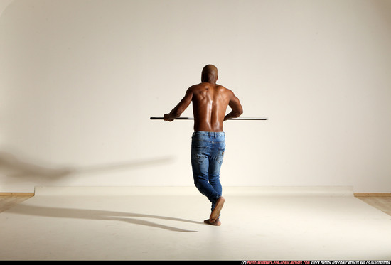 Man Adult Athletic Black Fighting with spear Moving poses Pants