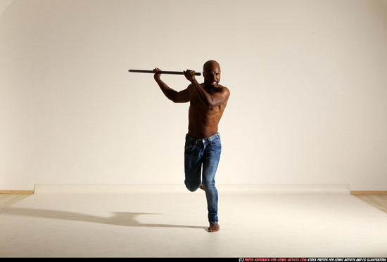 Man Adult Athletic Black Fighting with spear Moving poses Pants