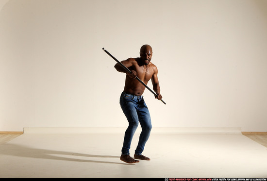 Man Adult Athletic Black Fighting with spear Moving poses Pants