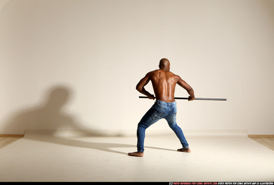 Man Adult Athletic Black Fighting with spear Moving poses Pants