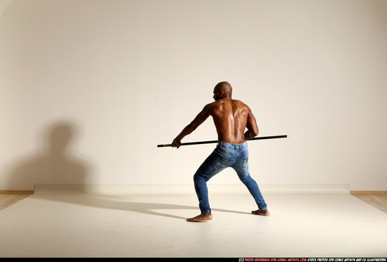 Man Adult Athletic Black Fighting with spear Moving poses Pants