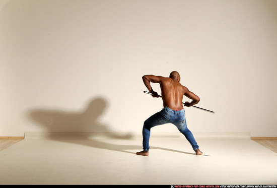 Man Adult Athletic Black Fighting with spear Moving poses Pants