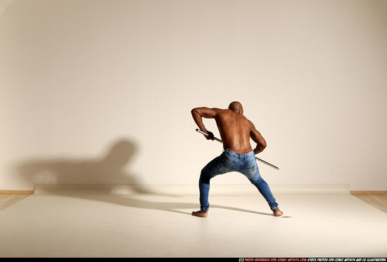 Man Adult Athletic Black Fighting with spear Moving poses Pants