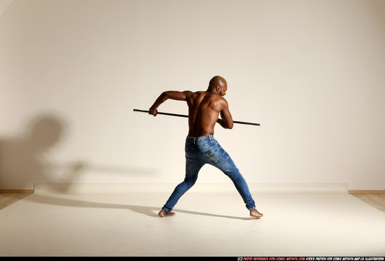 Man Adult Athletic Black Fighting with spear Moving poses Pants