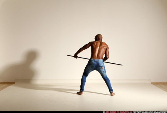 Man Adult Athletic Black Fighting with spear Moving poses Pants