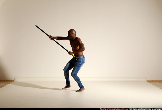 Man Adult Athletic Black Fighting with spear Moving poses Pants